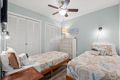 Bedroom featuring dark hardwood / wood-style floor