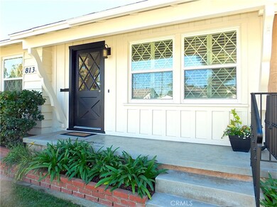 Dual-pane vinyl windows throughout with plantation shutters.