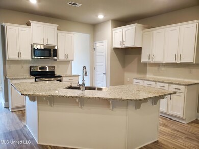 Katherine on 2 kitchen 1