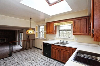 Kitchen has open view of the Family Room - skyligh