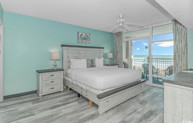 Bedroom featuring light hardwood / wood-style floo