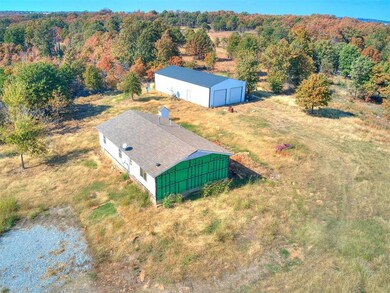 Looking from SE to NW, Showing Garage and House