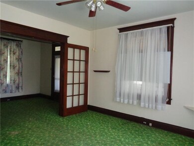 Living Room with French Doors looking into the Foy