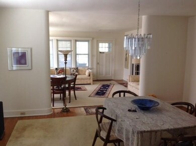VIEW FROM DININGROOM TOWARDS FRONT DOOR.