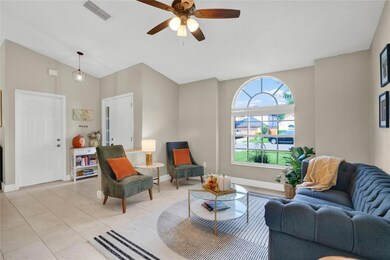 Living Room with view of garage door & front door