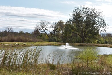 Community/neighborhood pond featuring fountain for