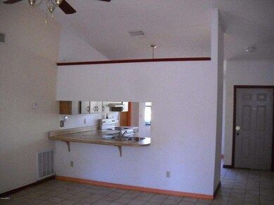 Breakfast bar & vaulted open floor plan