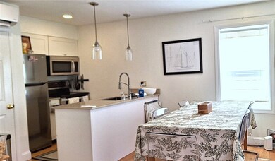 Open space kitchen/diningarea and living area brin