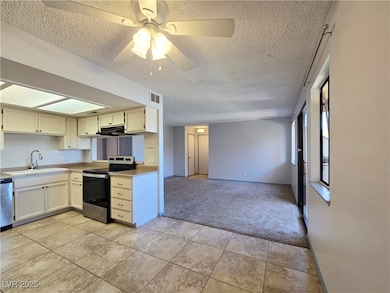 Kitchen featuring appliances with stainless steel