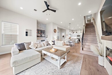Spacious living area accentuated by 11' ceilings a
