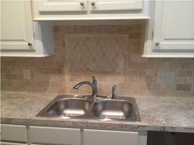 Pretty tile work over sink