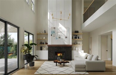Living room with a high ceiling, wood finished floors, plenty of natural light, a chandelier, and built in features