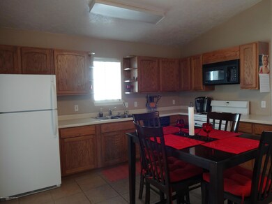 Plenty of Oak Cabinets
