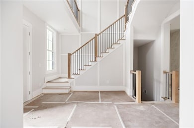 Two story foyer with custom molding
