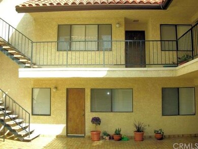 Courtyard entry with upstairs and downstairs entra