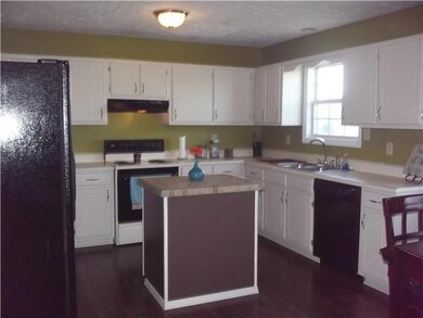 Look at all the cabinet space in this kitchen and an island!