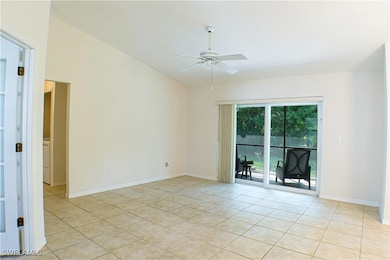 Empty room featuring baseboards, ceiling fan, vaul