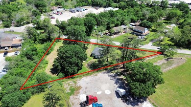 Situated on 3/4 of an acre, this property boasts m