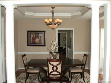 Two wooden columns accentuate the transition betwe