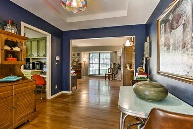Trey ceiling juxtaposed against hardwoods make the