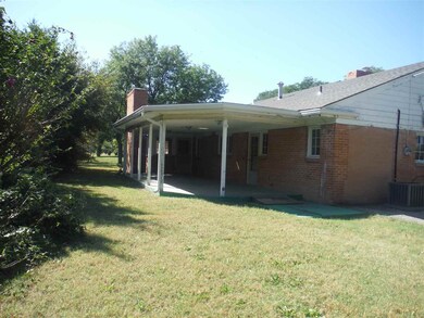 Rear of house showing the large covered patio.