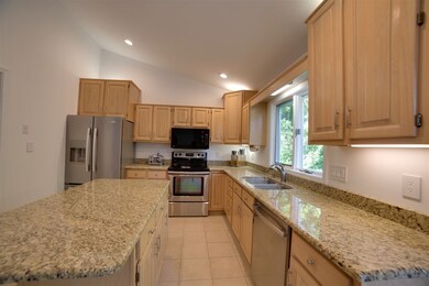 Stainless steel appliances, granite counters and c