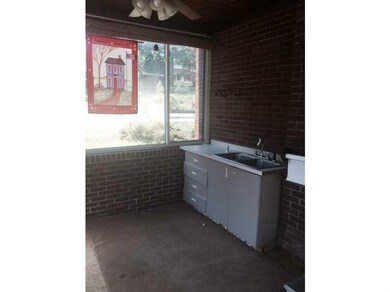 Exterior Front. Sun Room off of kitchen and near t