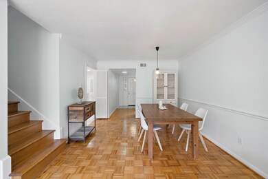 A view towards the front door. Kitchen is to the l