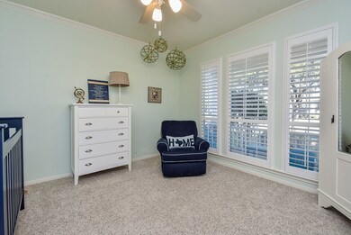 This is the study/flex room at the front of the home with french doors.  Love the windows in there!