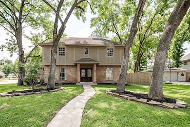 Large corner lot in established community!