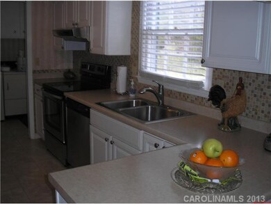 Kitchen - Kitchen with view of laundry room