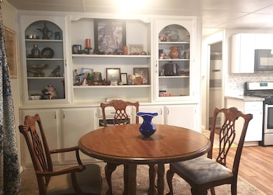 dining space with light wood builtin