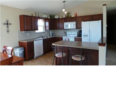 Kitchen island gives any chef plenty of room for b