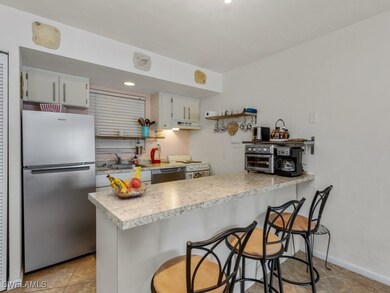 Kitchen featuring stainless steel appliances, a pe