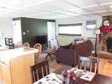 Part of kitchen and living area