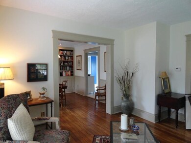 Beautifully restored hardwood floors in living and