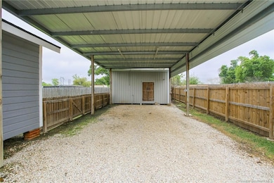 Large Driveway with 20x36 carport and 18x20 worksh