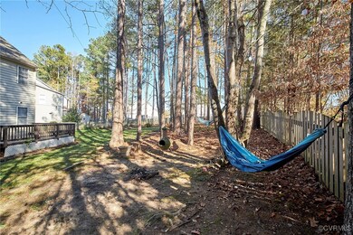 View of yard featuring a wooden deck