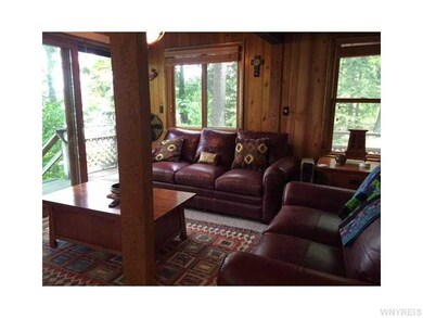 Great Room. Sliding glass doors leads to one of th