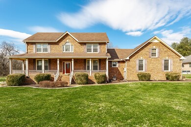 Large covered front and side porch!