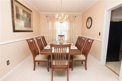 Now this is a formal dining room fit for a king! Entertain the whole family in this elegant space!