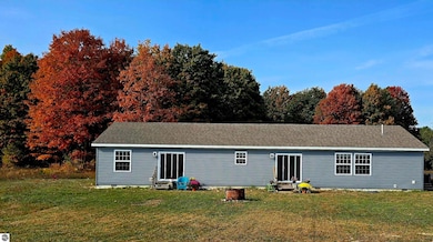 303 Westwood Rd NW, Alden, MI 49612 - photo 4