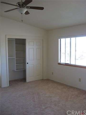 Master has vaulted ceilings, ceiling fan & a l