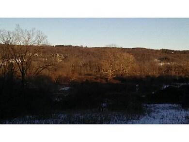Exterior Front winter view to Mud Creek