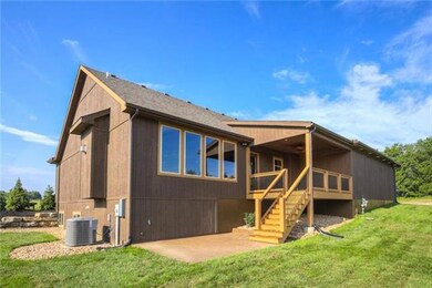 Back of home.  Covered deck.
