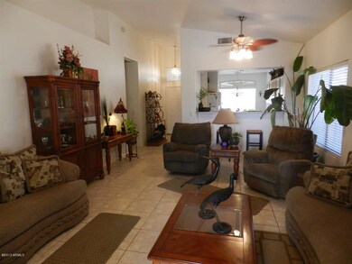 Living Room to Front and Kitchen