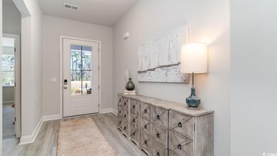 Entryway with light wood-type flooring