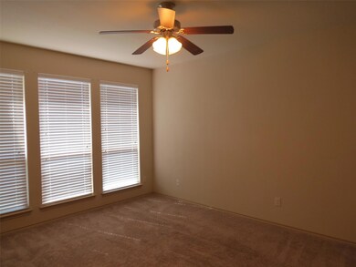 Primary Bedroom with Backyard Views