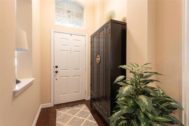 Entrance foyer with dark wood-type flooring