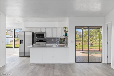 Remodeled kitchen/living room, sliders to Lanai